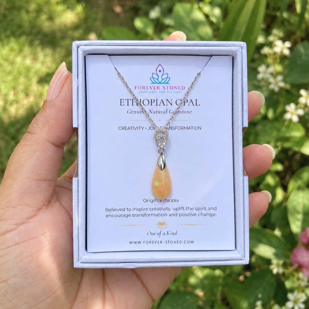 Natural Ethiopian Opal pendant packaged