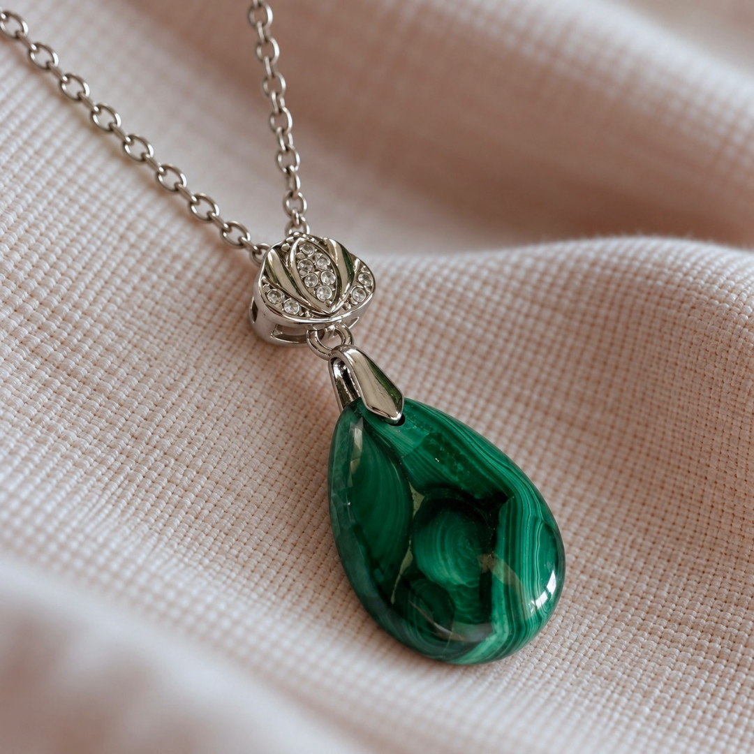 Close-up of natural Malachite pendant showing distinctive green banding